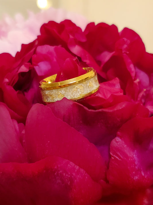 Gold breatmilk keepsake ring on a red peony